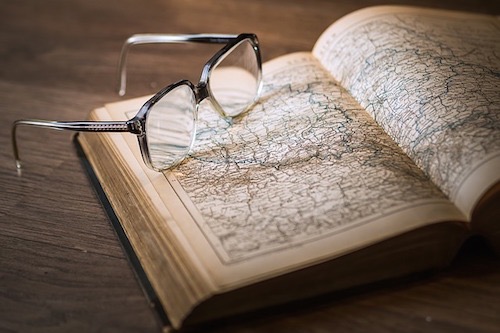 library book with glasses on top